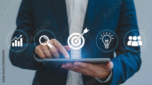 Concept of business strategy and future sustainable business finance action plan. Touching target board for creative and set up business objective target and success and business goals concept.