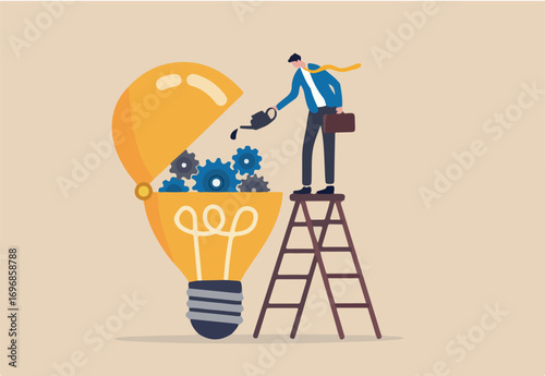 Maintenance brain to generate idea or creativity and innovation to invent new business ideas concept, businessman drop lubricant or grease into open lightbulb lamp with mechanical gears.