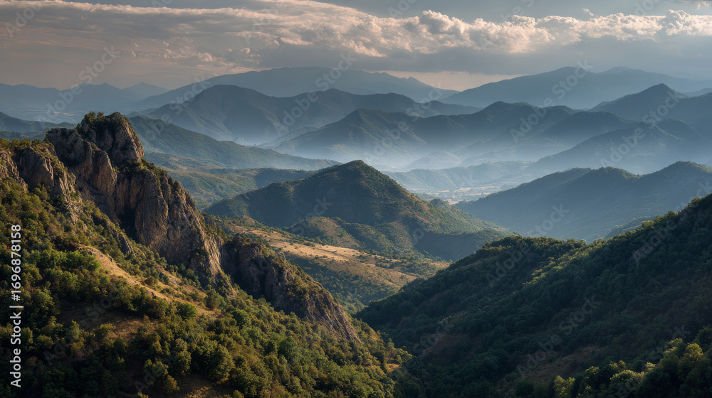 Obraz premium Panoramic view of snow-capped mountains under a clear blue sky