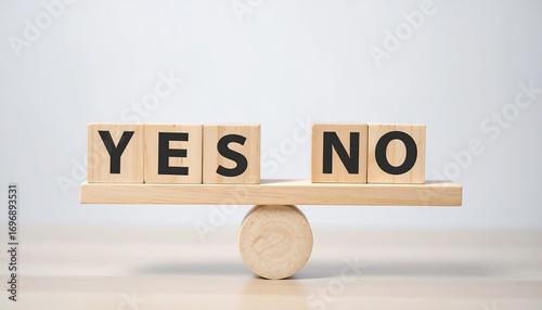 Wooden blocks on a seesaw