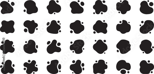 Collection of abstract black ink splatters and blots on white background