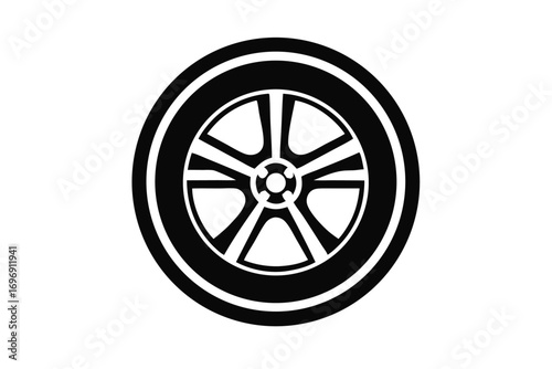 Black and White Image of a Car Tire with Five Spoke Rim Design