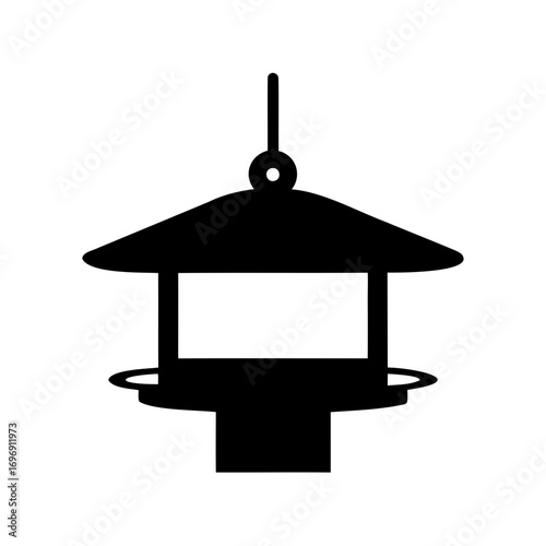 Silhouette of a traditional bird feeder house with a hanging hook