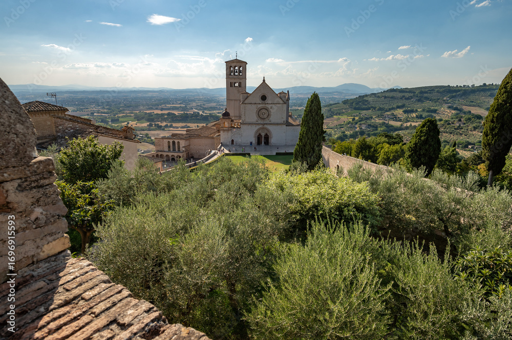 Naklejka premium Beautiful Tuscan historical Assisi Cathedral in the city of Assisi, Tuscany, Italy, Europe. Medieval atmosphere