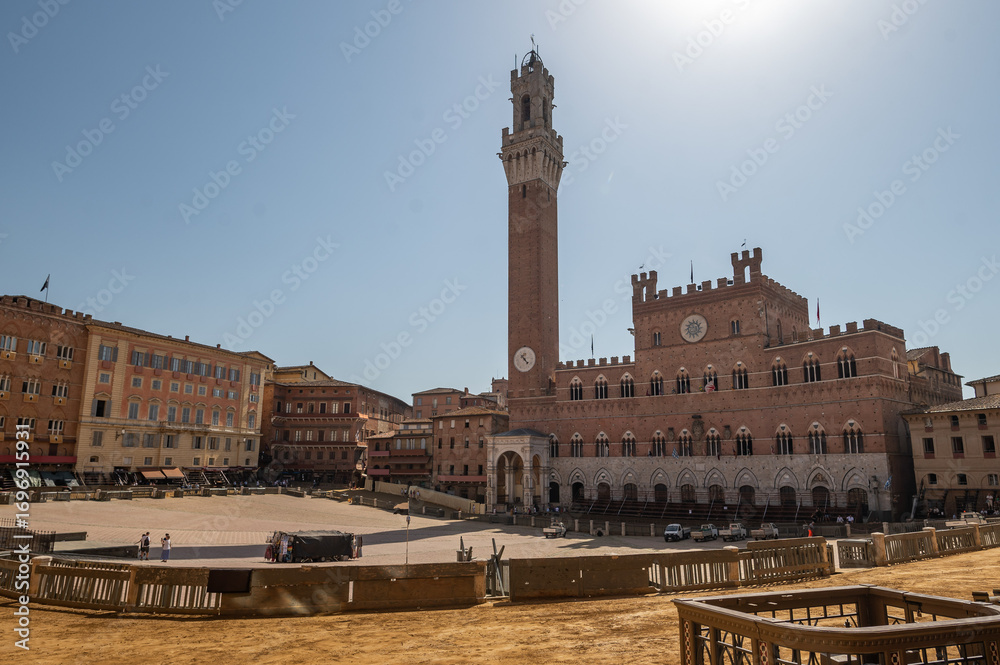 Naklejka premium Beautiful Tuscan historical Torre del Mangia in the city of Siena, Tuscany, Italy, Europe. Medieval atmosphere