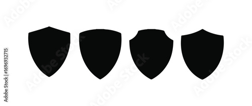 Four Black Shield Silhouettes Isolated on White Background Illustration Design Elements