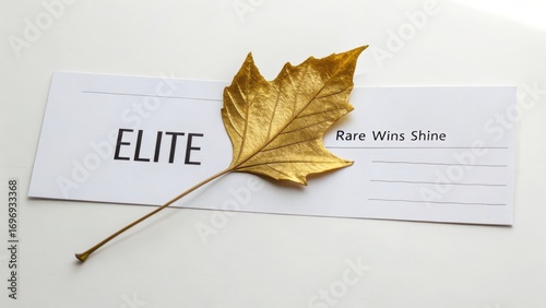 Golden Leaf on Elegant Paper with Elite Text and Inspirational Phrase