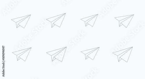 Eight minimalist paper airplanes in a grid pattern against a plain background