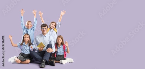 Male teacher and little stu...