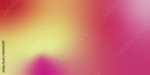 Abstract blend of warm yellow orange and vibrant pink hues creating a soft and inviting textured background
