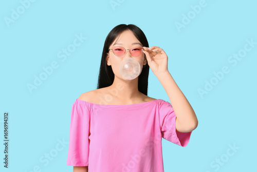 Pretty young Asian woman in...