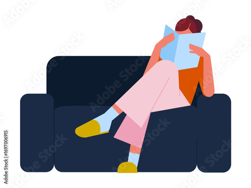 Woman sitting on sofa and reading