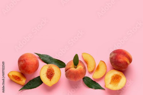 Sweet ripe peaches and leav...