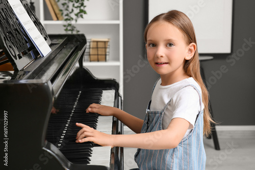Cute little happy girl with...