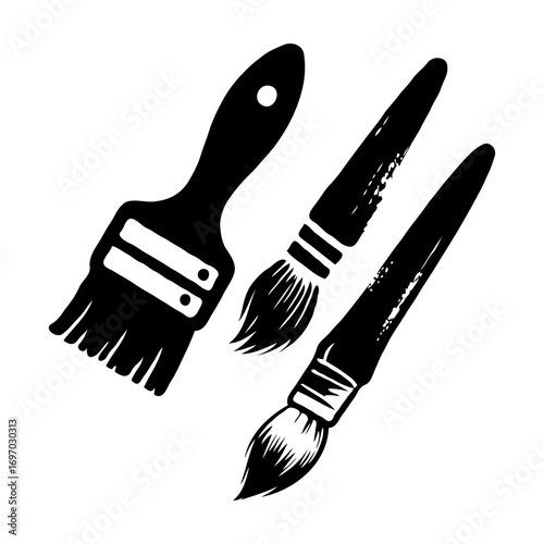 Black silhouette of three paintbrushes including flat and round styles, hand-drawn style, on a white background, concept of painting tools