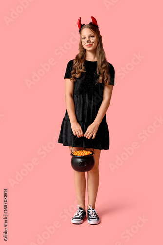 Cute happy girl dressed as ...