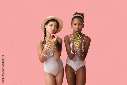 Cute little girls in swimsu...