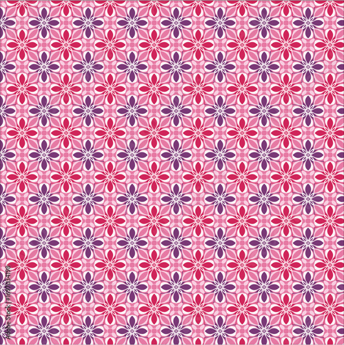 abstract symmetrical floral shapes arranged in a grid on a vivid hot pink background