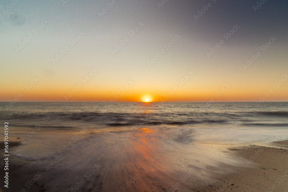 Fototapeta premium Tranquil Sunset Over the Ocean