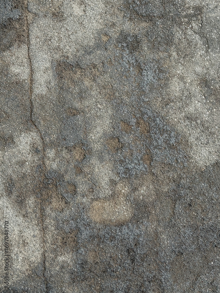 Obraz premium oil-stained asphalt texture