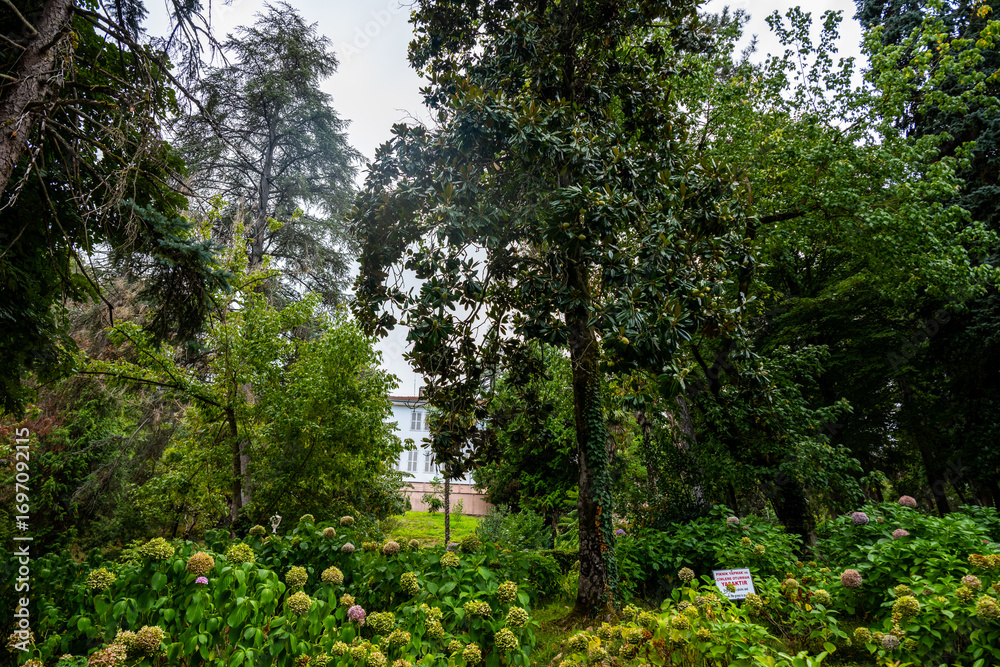 Fototapeta premium Garden view with historic building in Termal