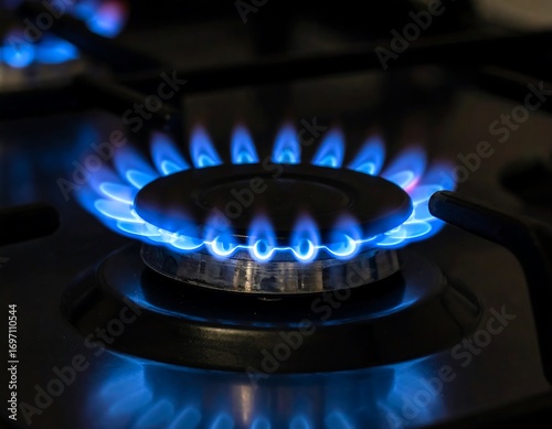 Close-up of gas burner, vibrant blue flames