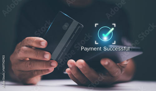 Digital payment concept. Businessman holding a credit card and smartphone with a 