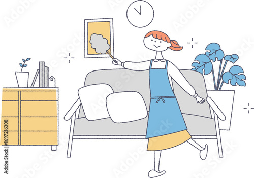 リビングの掃除をする女性