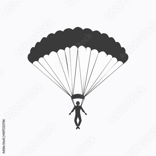 Skydiver descends with parachute in the sky during a jump, showcasing the thrill and adventure of extreme sports with a sense of freedom.