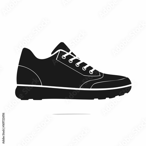 Black silhouette of a running shoe shown in profile on a white surface, suggesting athleticism and a minimalist aesthetic.