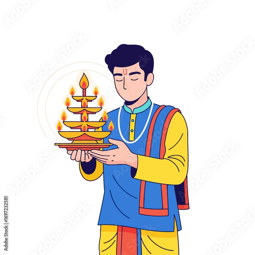 A man in traditional Indian attire respectfully holds a tiered diya, a symbol of light and celebration.