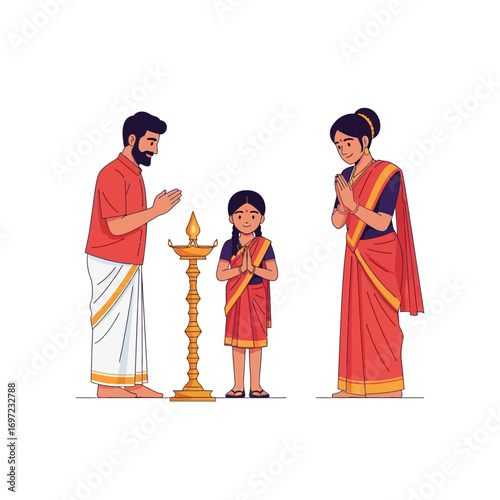 A South Asian family offering prayers in front of a traditional lamp.