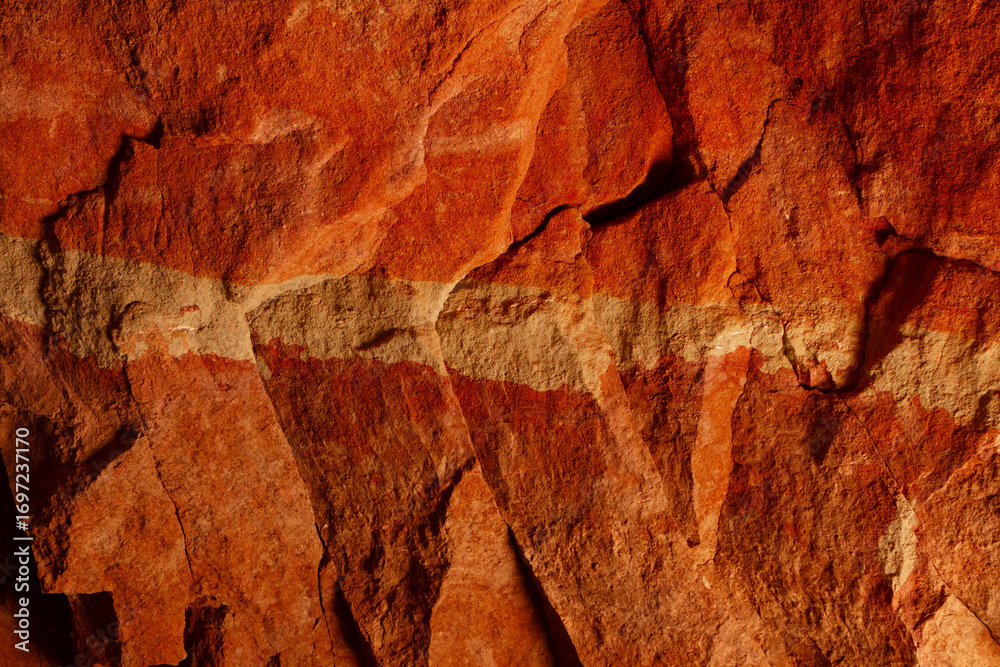Fototapeta premium Rocky texture of the Lion's Cave caverns.A few kilometers from Cipolletti, on the south bank of the Negro River, you can enter the rock formations, watch birds, and enjoy a panoramic view.
