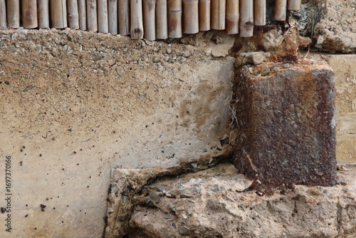 old brick wall with hole