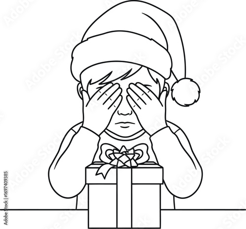 Child with Santa hat peeking from behind hands at a Christmas gift, anticipation and wonder.