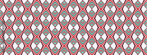 A festive repeating pattern featuring geometric diamond shapes in traditional Christmas colors and festive accents.
