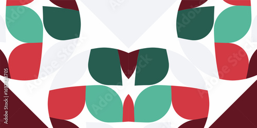 A festive geometric pattern in Christmas colors featuring repeating abstract shapes in red and green. 