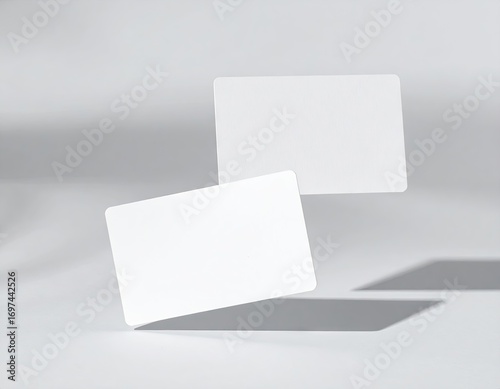Floating White Business Cards Mockup on Light Gray Background