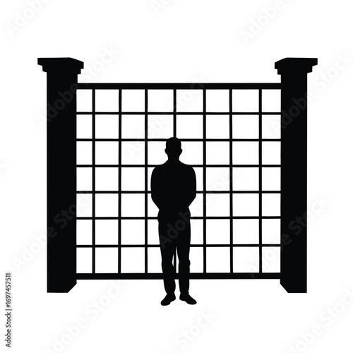 Silhouette of a man standing in front of a barred gate Keywords: silhouette, man, standing, gate