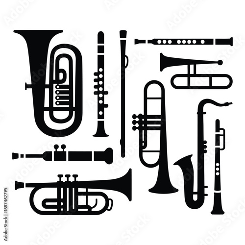 Collection of silhouetted brass and woodwind musical instruments