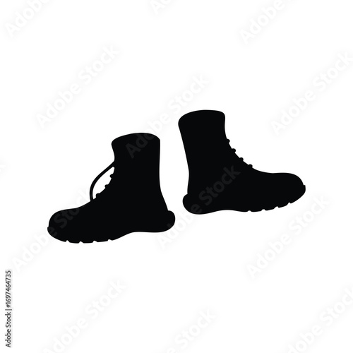 Black silhouette of two ankle high lace up boots on white background