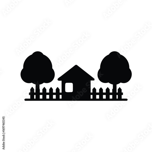 Silhouette of a house with trees and a fence in black