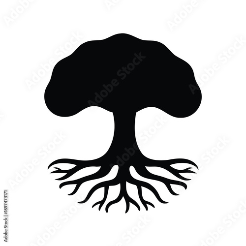 Majestic tree silhouette displaying its intricate root system reaching far below
