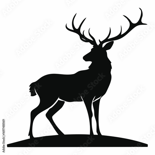 Elegant black silhouette of a male red deer stag with impressive antlers, representing the untamed spirit of forest wildlife