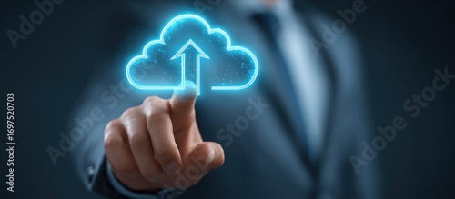 Man in suit touches a glowing, neon cloud with an upward-pointing arrow. Dark, professional background