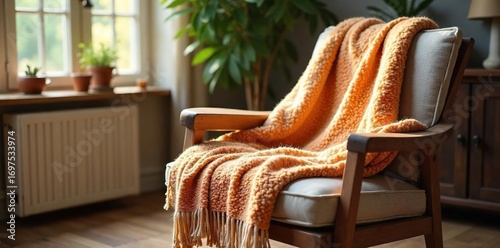 Cozy, warm wool throw blanket draped over a rustic wooden armchair in a sunlit living room Perfect for adding texture and warmth to your interior design , armchair, knit, interior