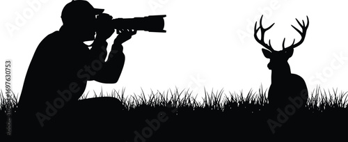 Silhouette of a photographer taking a picture of a deer, capturing wildlife