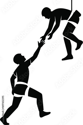 Silhouette of climber helping another reach top, symbolizing support and teamwork