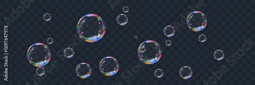 Realistic colorful soap bubbles on transparent background