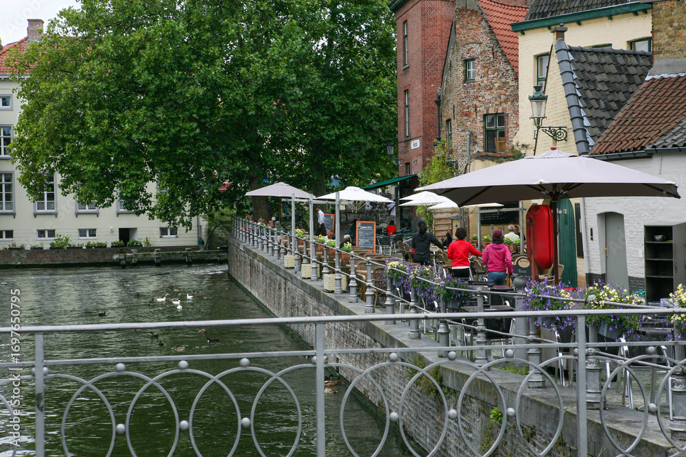 Fototapeta premium Riverside Cafe Terrace in Bruges Old Town